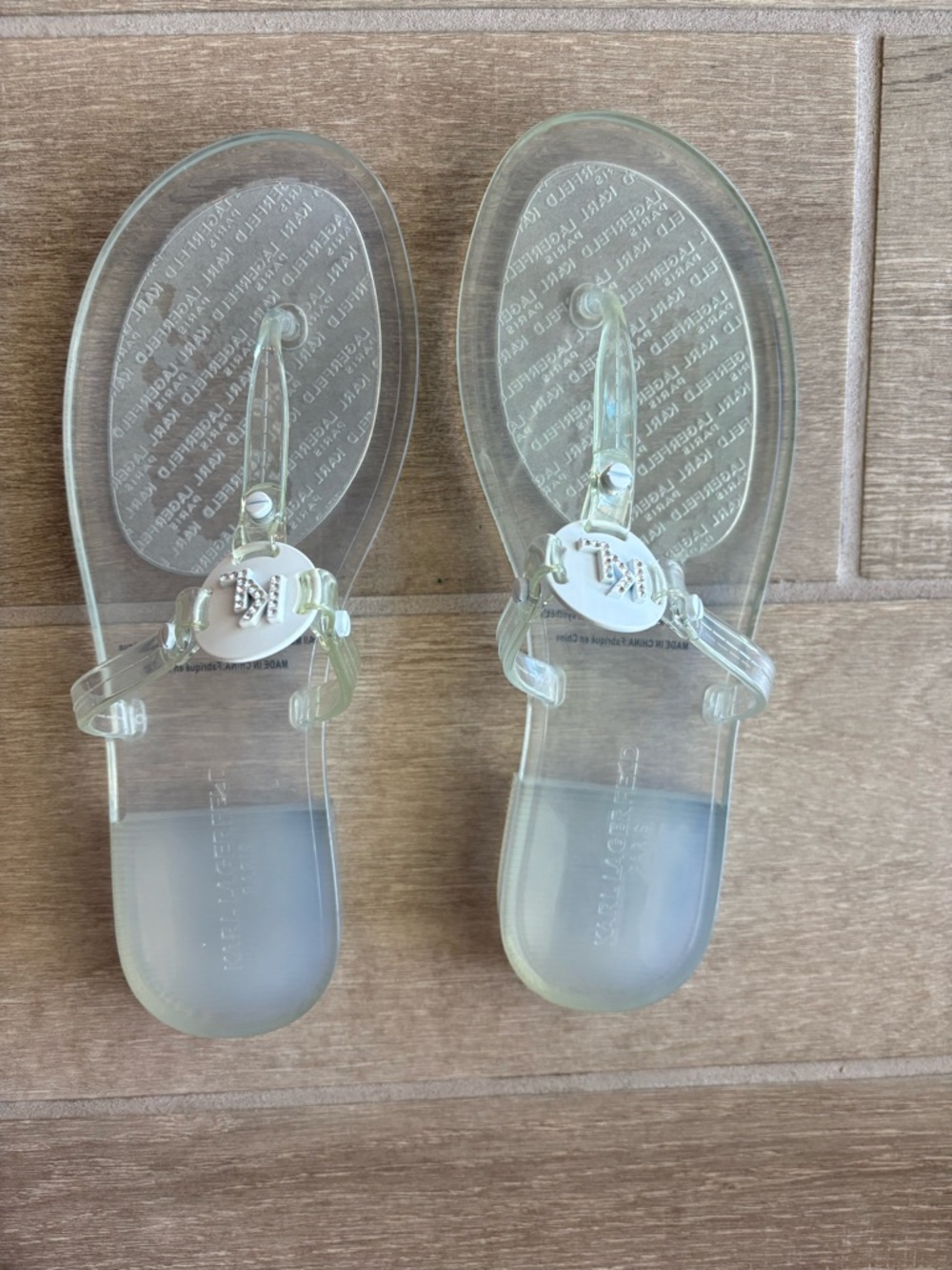 Karl Lagerfeld Paris Women's Wylda transparent jelly thong sandal
